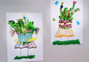 Zdjęcie, na którym znajdują się przestrzenne prace plastyczne wykonane przez dzieci. Przedstawiają "portret Pani Wiosny". Widać na nich tylko nogi i sukienkę pani Wiosny, która niesie ogromny bukiet kolorowych kwiatów.