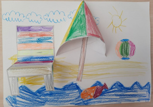 Rysunek dziecka "Plażing" Kolorowy leżak i parasol plażowy doklejone są do plaży. Nic tylko wypoczywać.